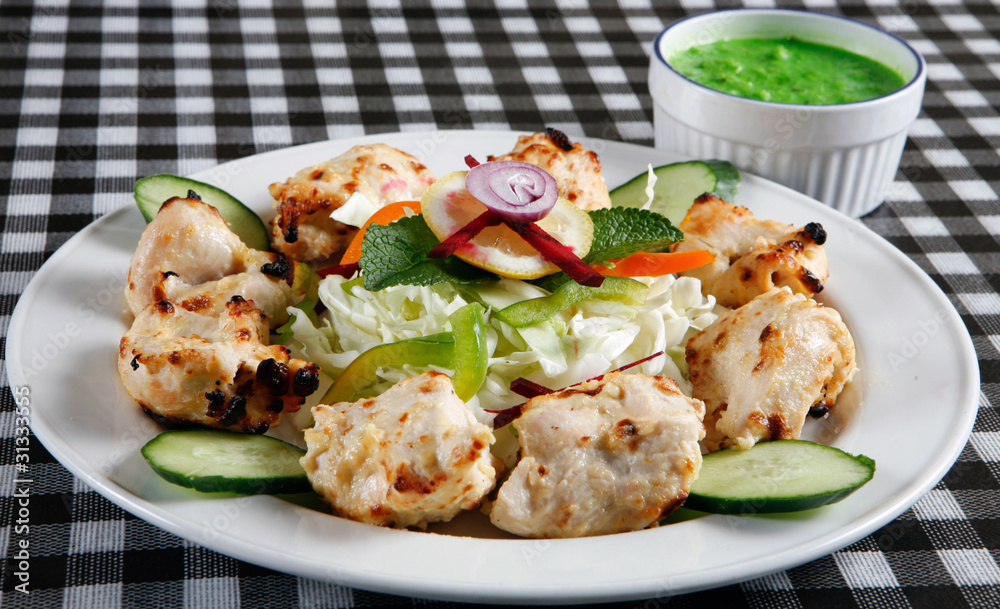 Seekh kebab with salad and sauce Seekh kebab with salad and sauce