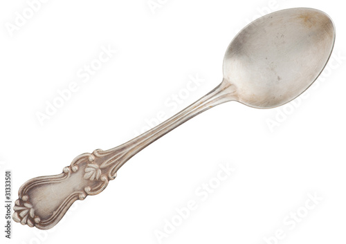 Old silver spoon with floral ornament