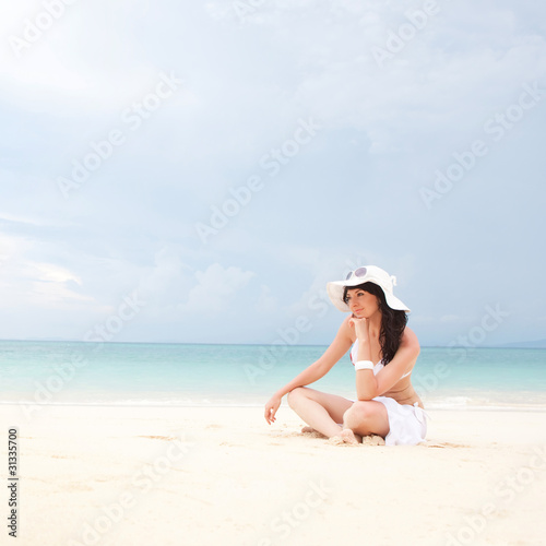 Wallpaper Mural Young fashion woman on the beach Torontodigital.ca