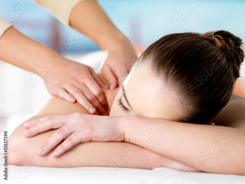 Woman relaxing on spa massage