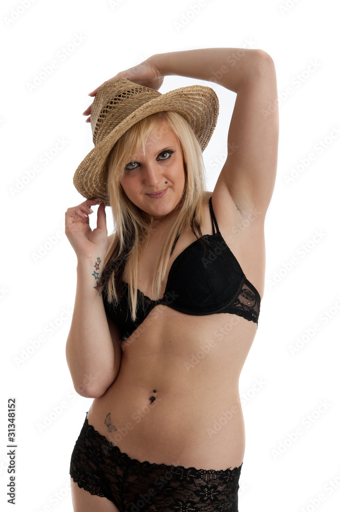 Pretty blonde female in lingerie and straw hat Pretty blonde female in lingerie and straw hat