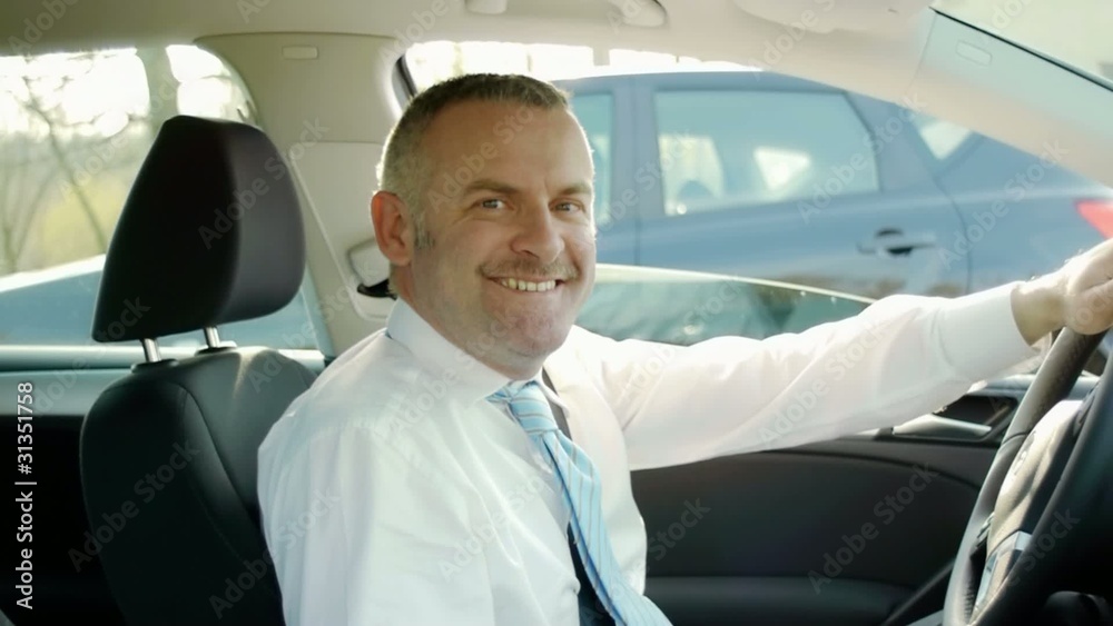 businessman calling on mobile phone in car businessman calling on mobile phone in car
