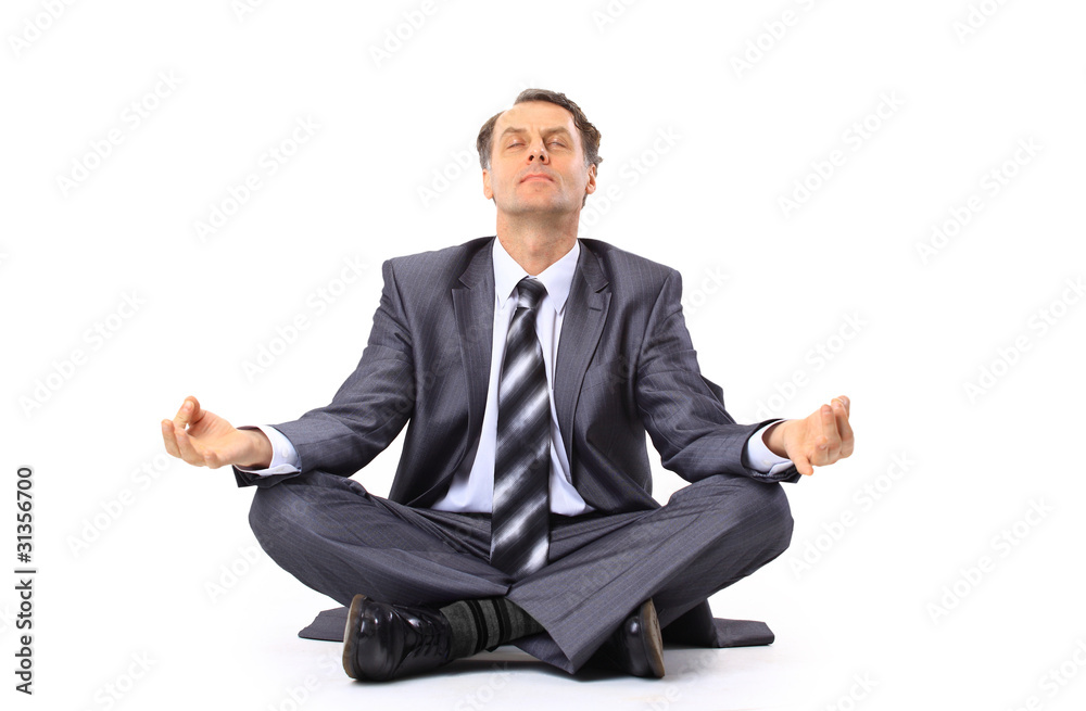 relaxed businessman meditating isolated on white relaxed businessman meditating isolated on white