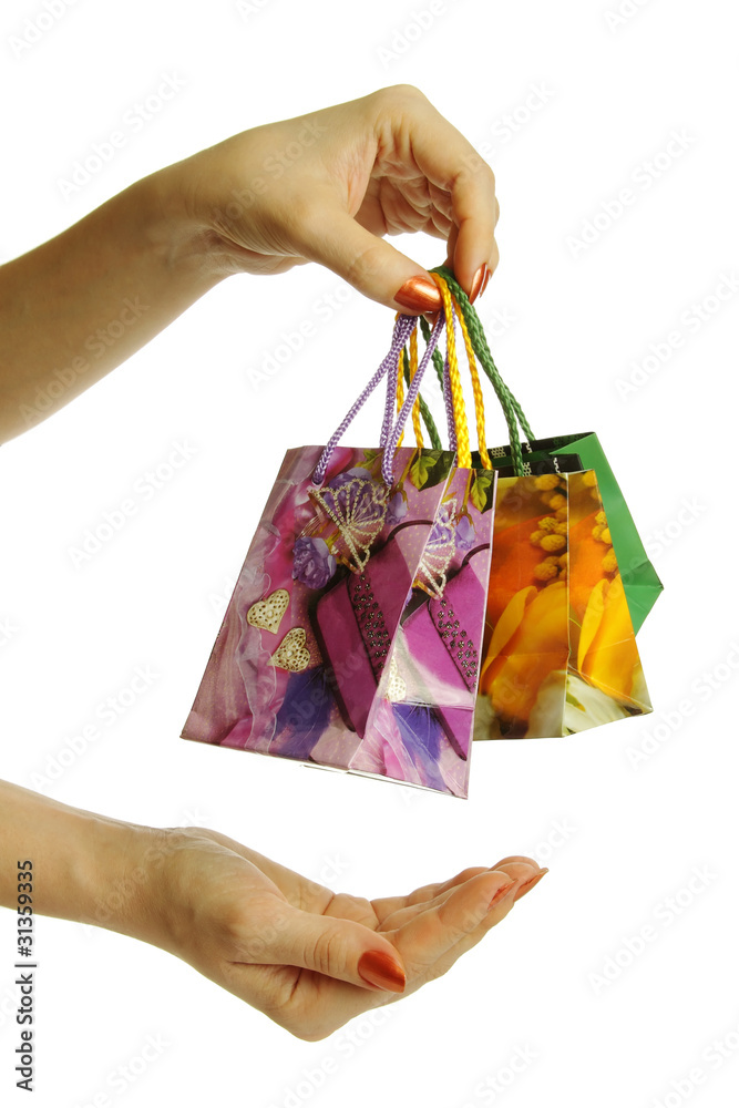 Shopping bags in hand, isolated