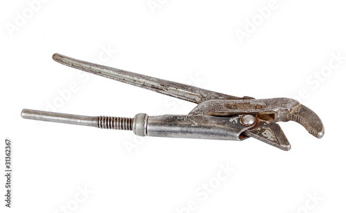 Old rusty adjustable gas wrench, isolated on white background