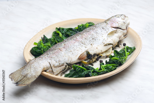 bream baked with Italian herbs and fried spinach