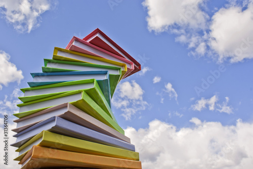 Obraz na płótnie Stack of colored cover books w salonie