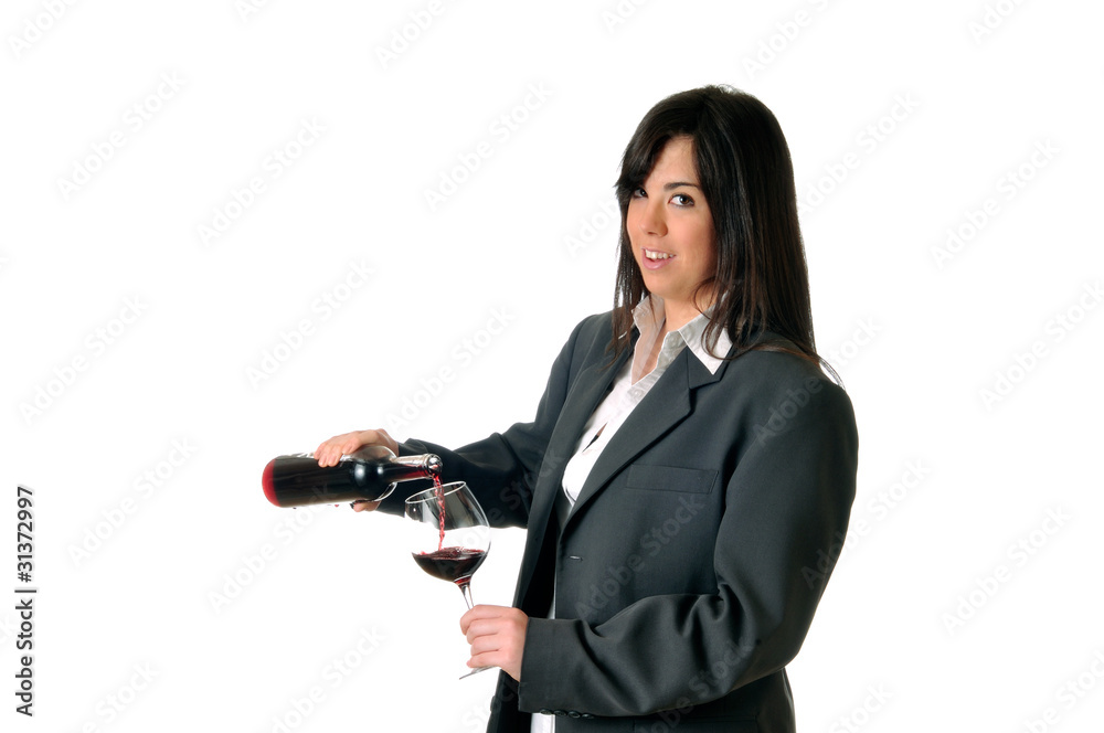 young brown woman filling a glass of wine young brown woman filling a glass of wine
