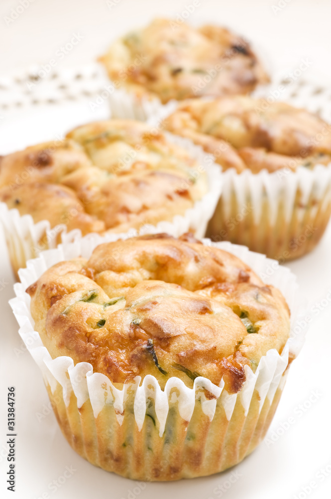 Freshly baked spinach and cheese muffins ready to be served Freshly baked spinach and cheese muffins ready to be served