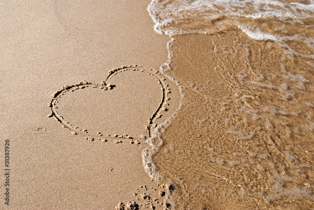 Herz im Sand StockFoto Adobe Stock