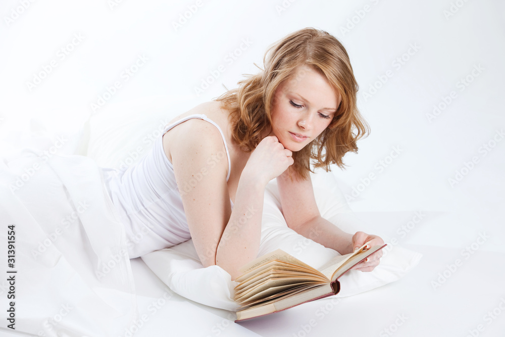 young beautiful girl reads book young beautiful girl reads book