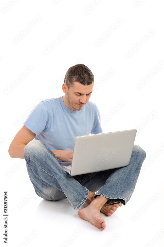 handsome young male study on laptop computer. isolated handsome young male study on laptop computer. isolated