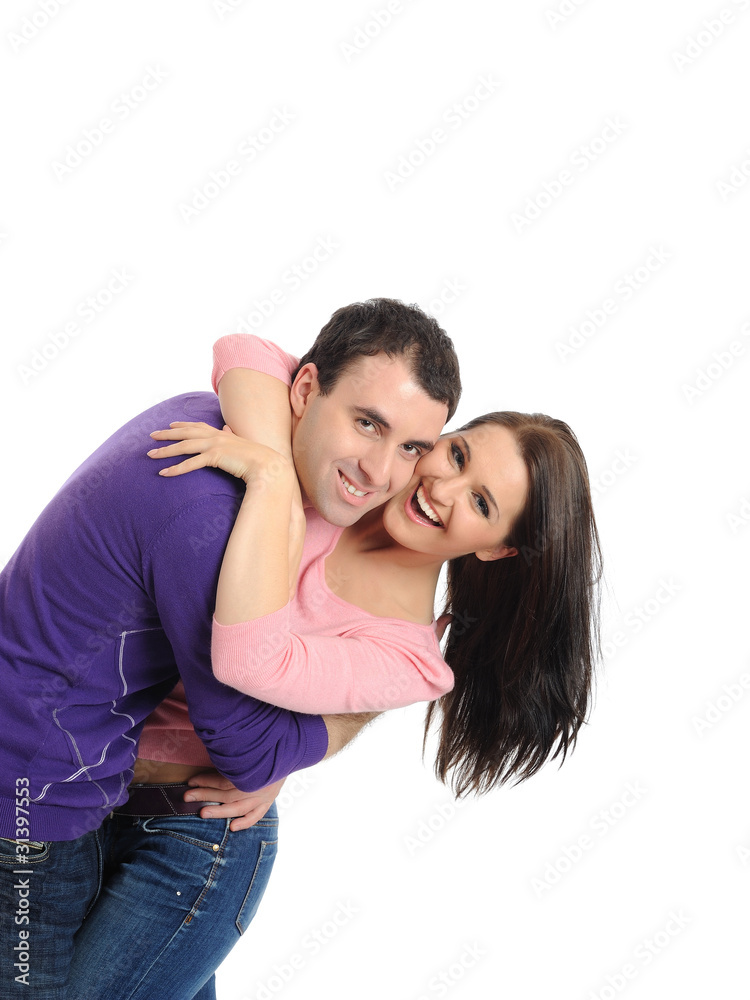 Lovely young couple having fun and smiling. isolated Lovely young couple having fun and smiling. isolated