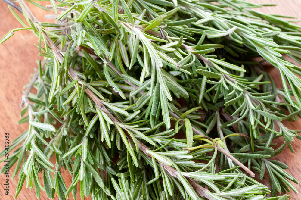 Rosemary bound on a wooden table Rosemary bound on a wooden table