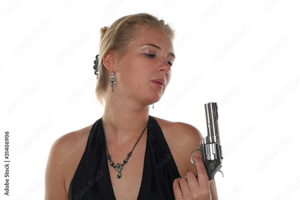 young blond woman in black dress with revolver young blond woman in black dress with revolver