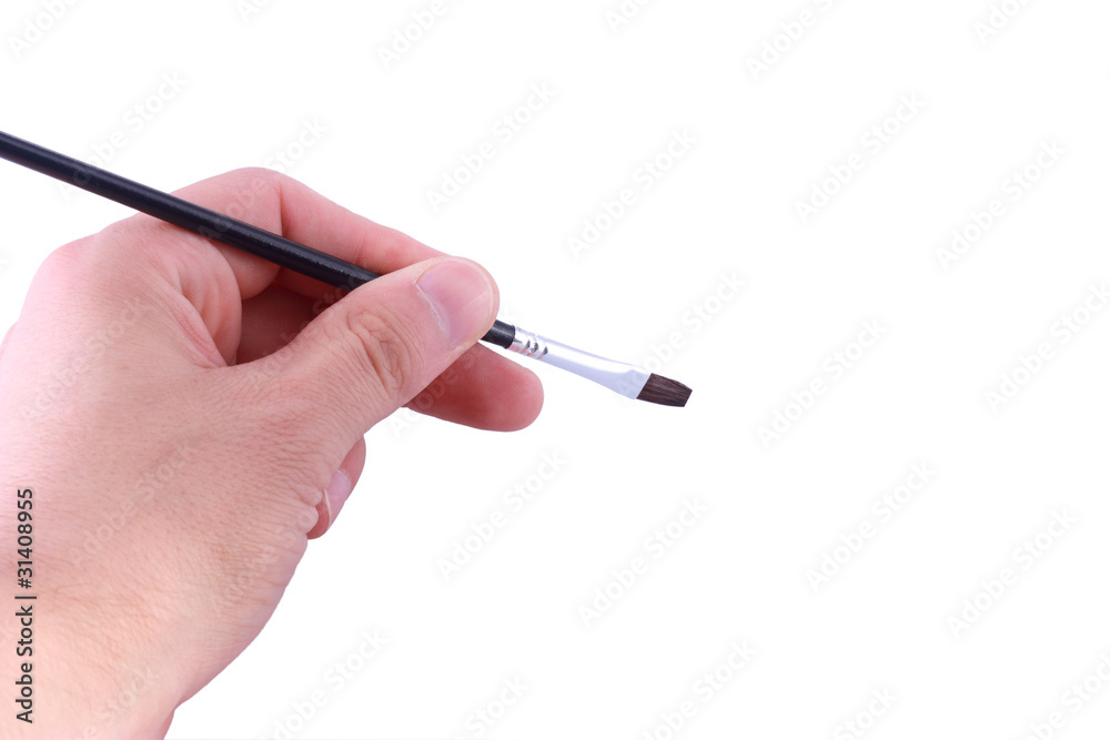 Hand holding artist brush isolated on white Hand holding artist brush isolated on white