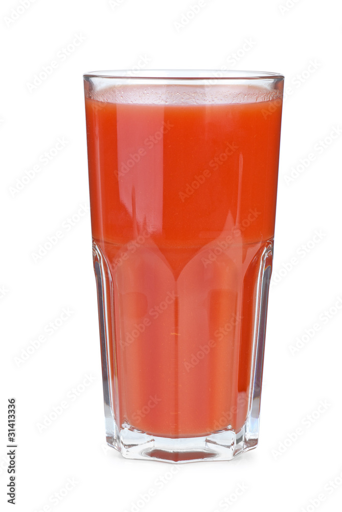 Drinking glass filled with tomato juice Drinking glass filled with tomato juice