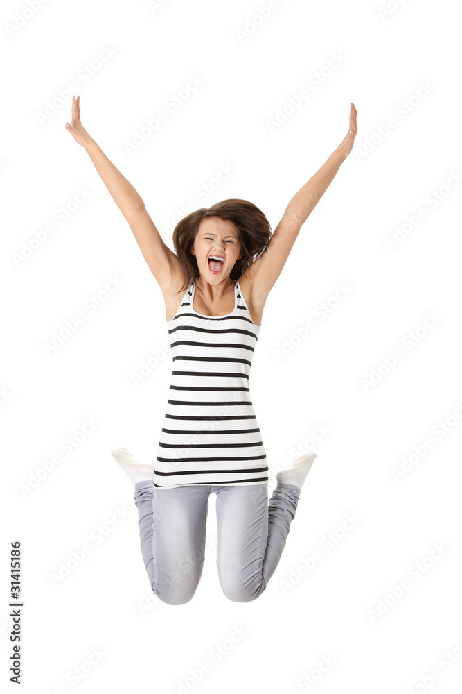 Young happy caucasian woman jumping in the air Young happy caucasian woman jumping in the air