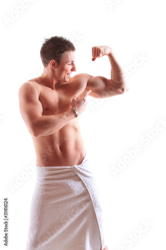 Beautiful muscular man with the towel.