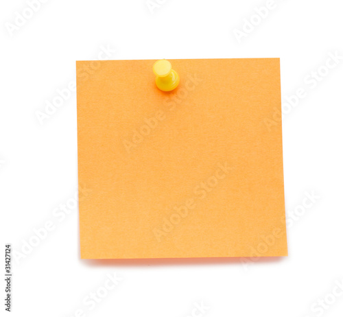 Orange post-it with drawing pin