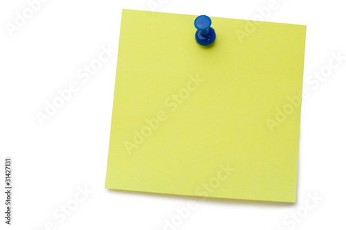 Yellow post-it with drawing pin