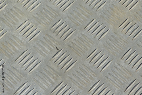 fond métal caillebotis