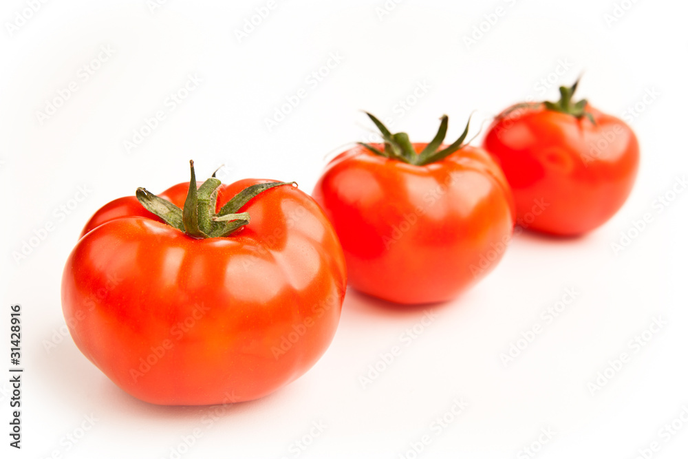 Drei Tomaten in einer Reihe Drei Tomaten in einer Reihe
