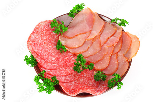 Slices of bacon on white background