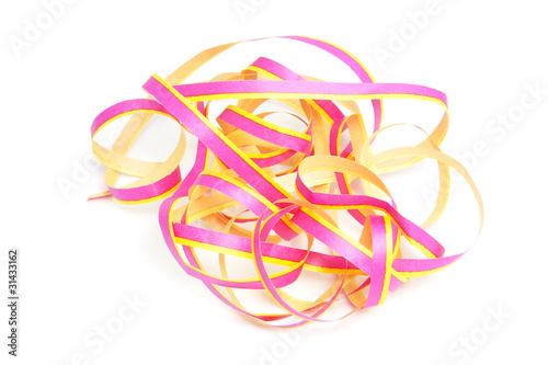 colorful curly party streamer over white background
