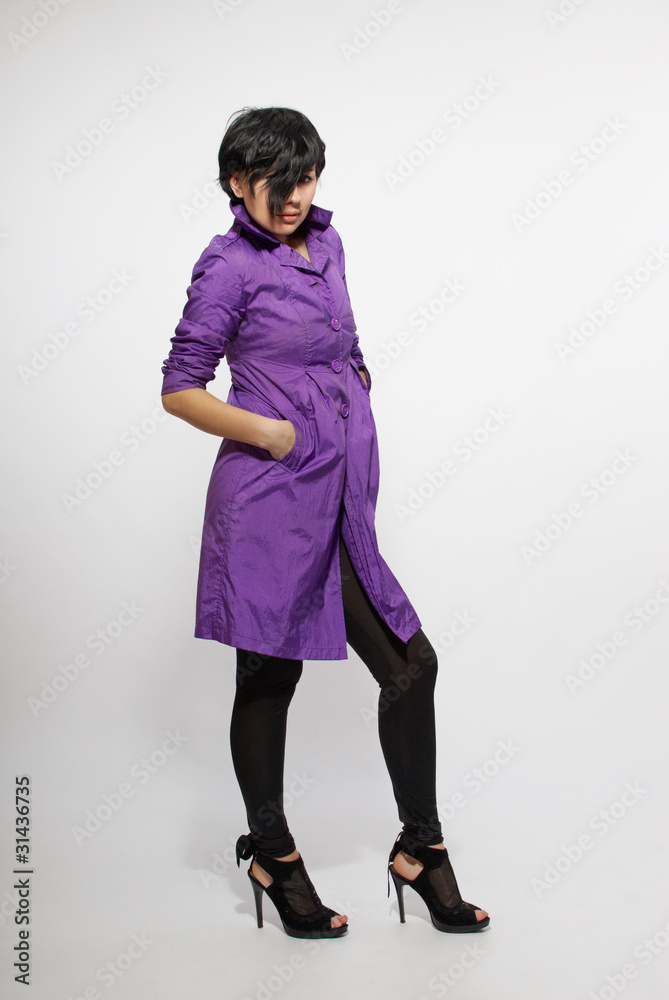 Pretty woman wearing purple coat Pretty woman wearing purple coat