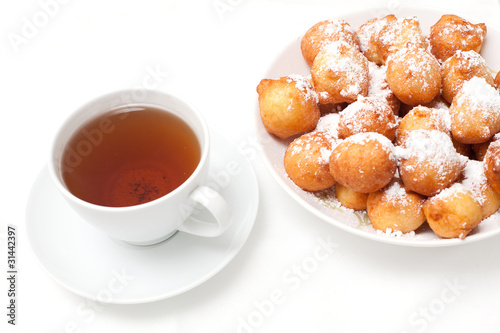 cup of tea and just baked donuts