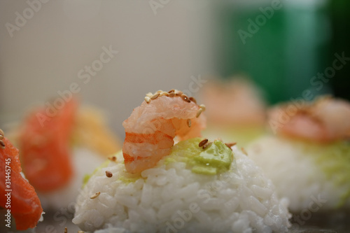 Nigirisushi: rice sushi with scrimp topping photo