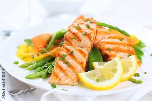 grilled salmon with asparagus, pea, yellow peppers, carrots and