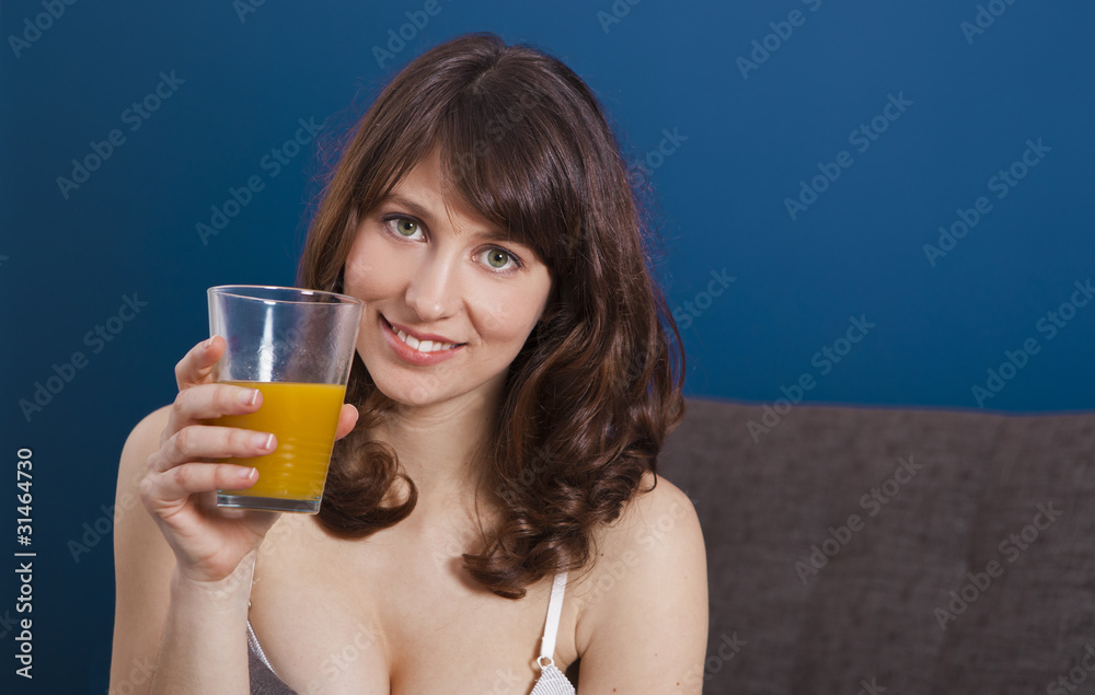 Drinking orange juice Drinking orange juice