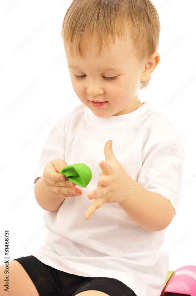 Photo of a little boy with a flat balloon