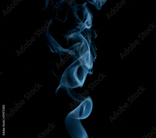 Abstract blueish smoke on black