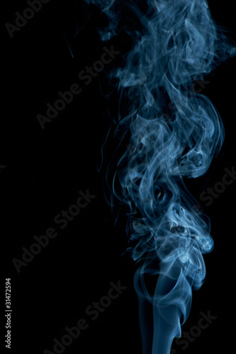 Abstract blueish smoke on black