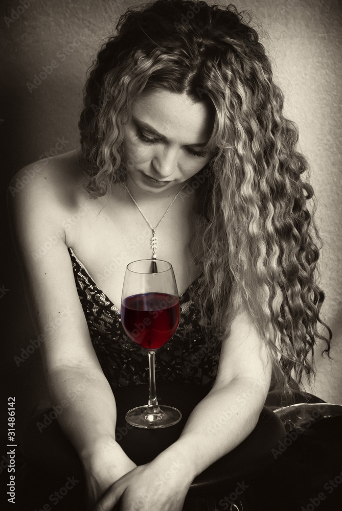 portrait shot of a caucasian woman with a red wine glass portrait shot of a caucasian woman with a red wine glass