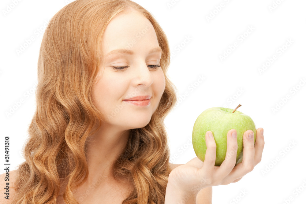 young beautiful woman with green apple young beautiful woman with green apple