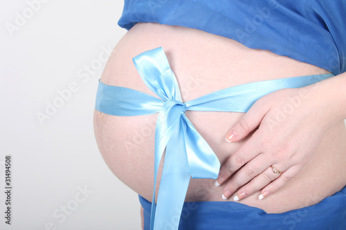 Wallpaper Mural Beautiful belly with blue ribbon Torontodigital.ca