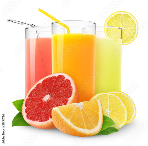 Isolated citrus juice. Three glasses with orange, grapefruit and lemon juice and cut fruits isolated on white background