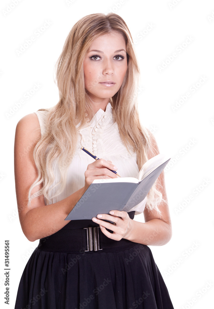 Blond businesswoman with notebook and pen isolated on white Blond businesswoman with notebook and pen isolated on white