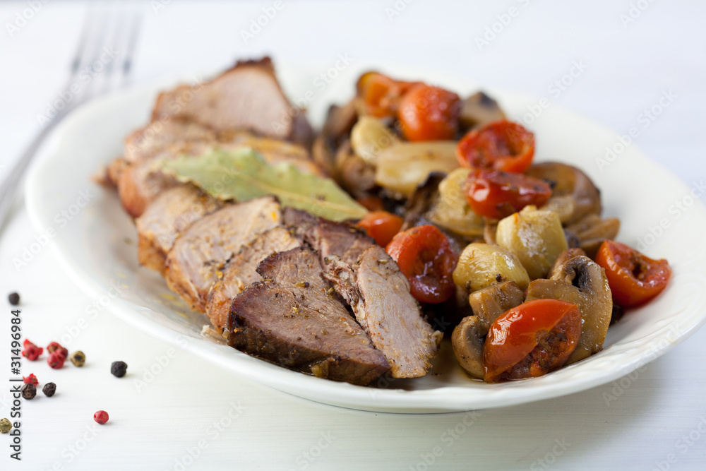 Roast pork with baked vegetables and mushrooms Roast pork with baked vegetables and mushrooms