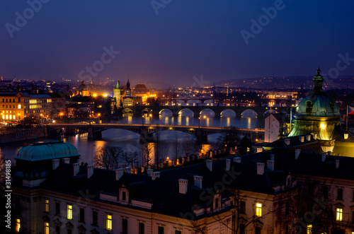 Illuminated Prague briges night panorama, Czech Republic photo