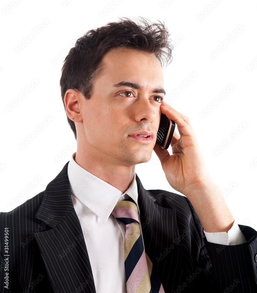 Businessman talking at the phone isolated on white Businessman talking at the phone isolated on white