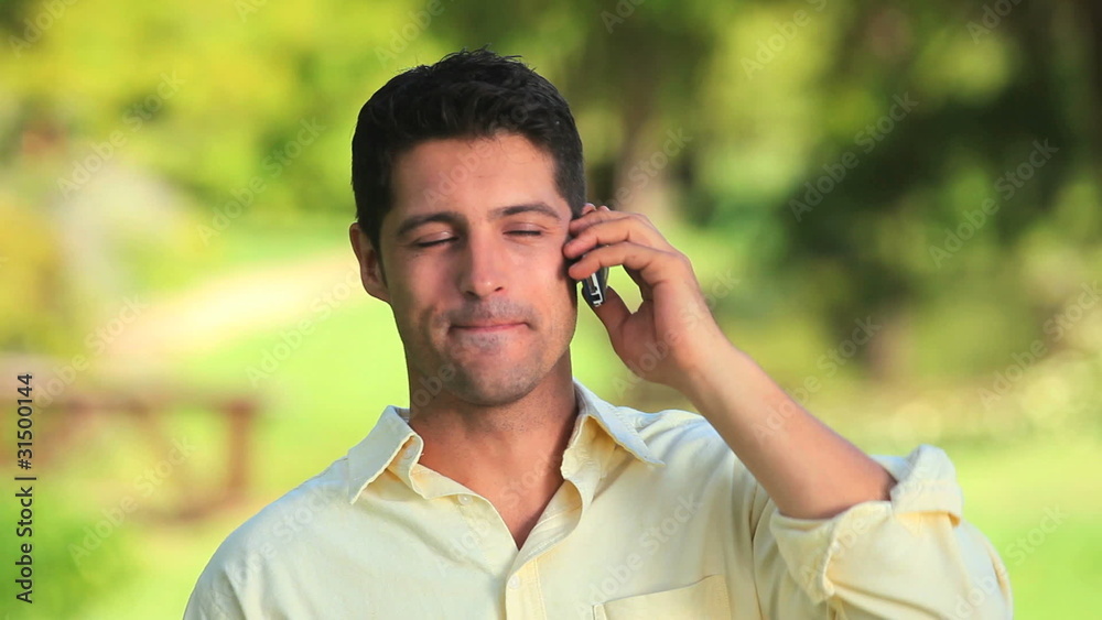 Happy man on mobile phone Happy man on mobile phone
