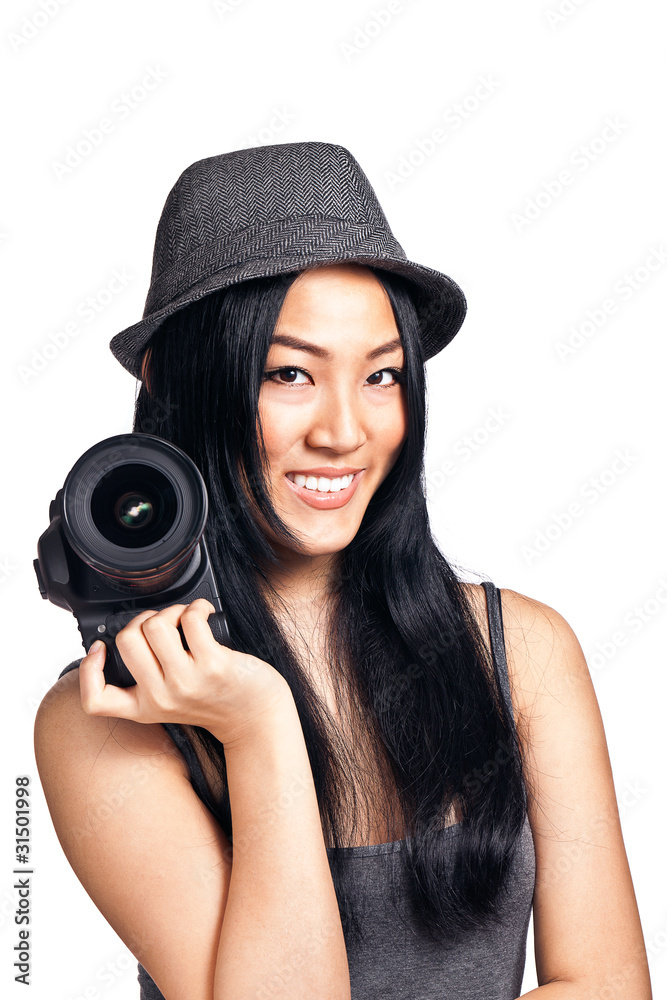 Young asian girl posing with a camera Young asian girl posing with a camera