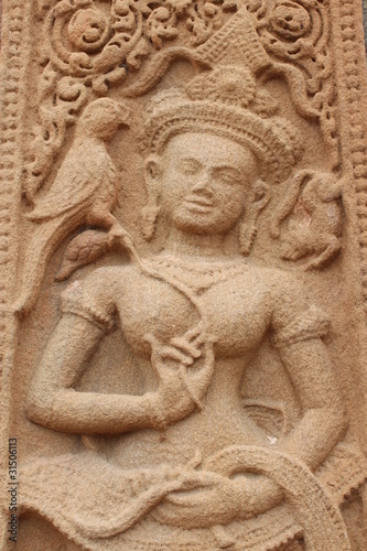 Sandstone carving at Prasat Sikhoraphum Sanctuary, Surin photo