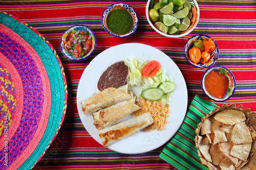 Burritos mexican rolled food rice salad and frijoles