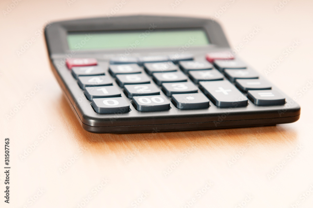Business concept with accounting calculator Business concept with accounting calculator